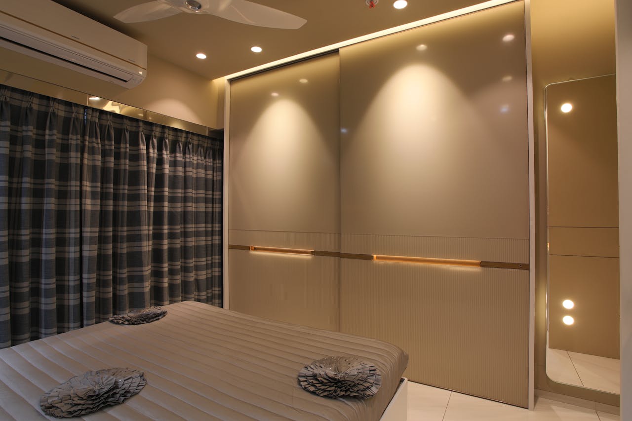 Sleek modern bedroom featuring contemporary design and ambient lighting.